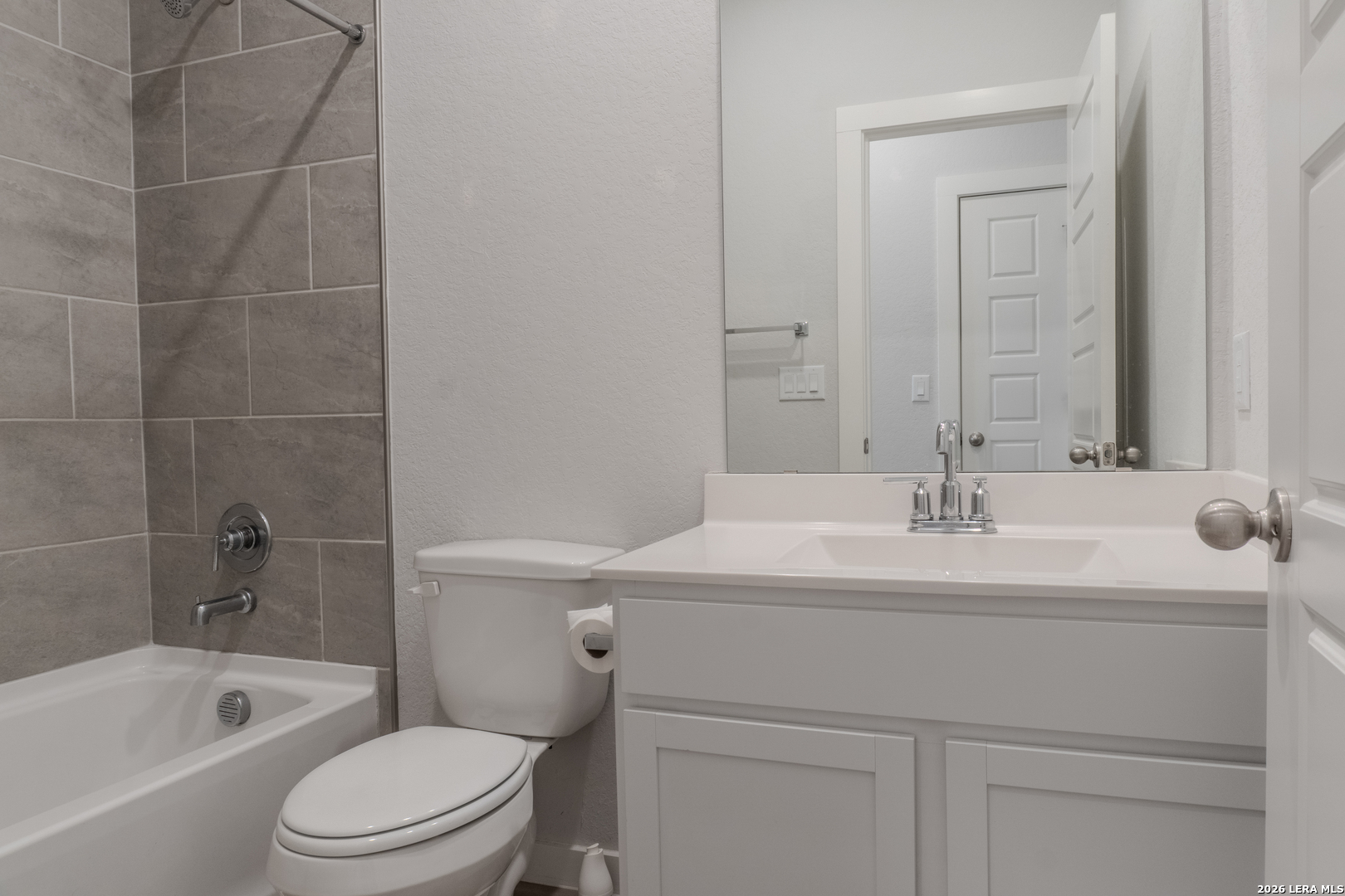 175 Ryan Crossing San Antonio, TX 78253 - Photo 23 of 37 a bathroom with a sink toilet vanity and tub