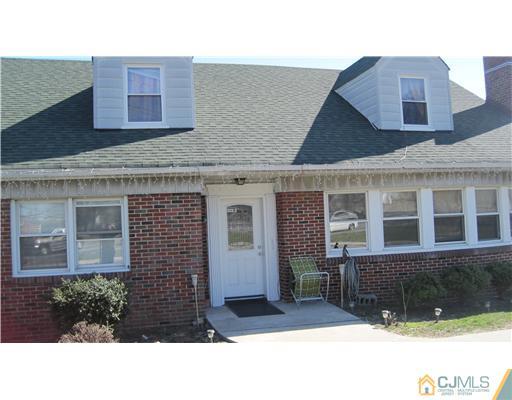 112 West Pond Road Hopelawn, NJ 08861 - Photo 5 of 5 a black and white building with a outdoor space