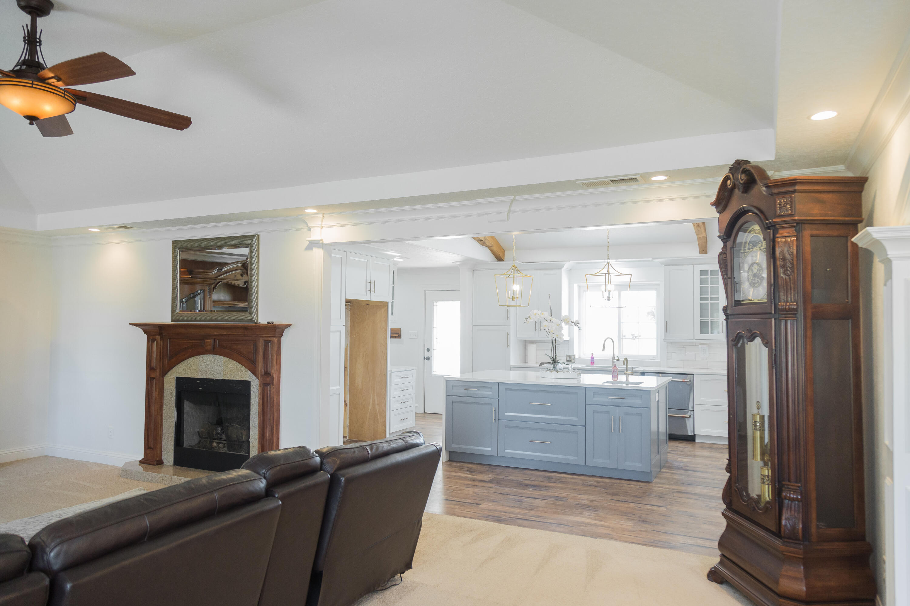 1308 West 24th Street Plainview, TX 79072 - Photo 11 of 85 a living room with furniture and a fireplace