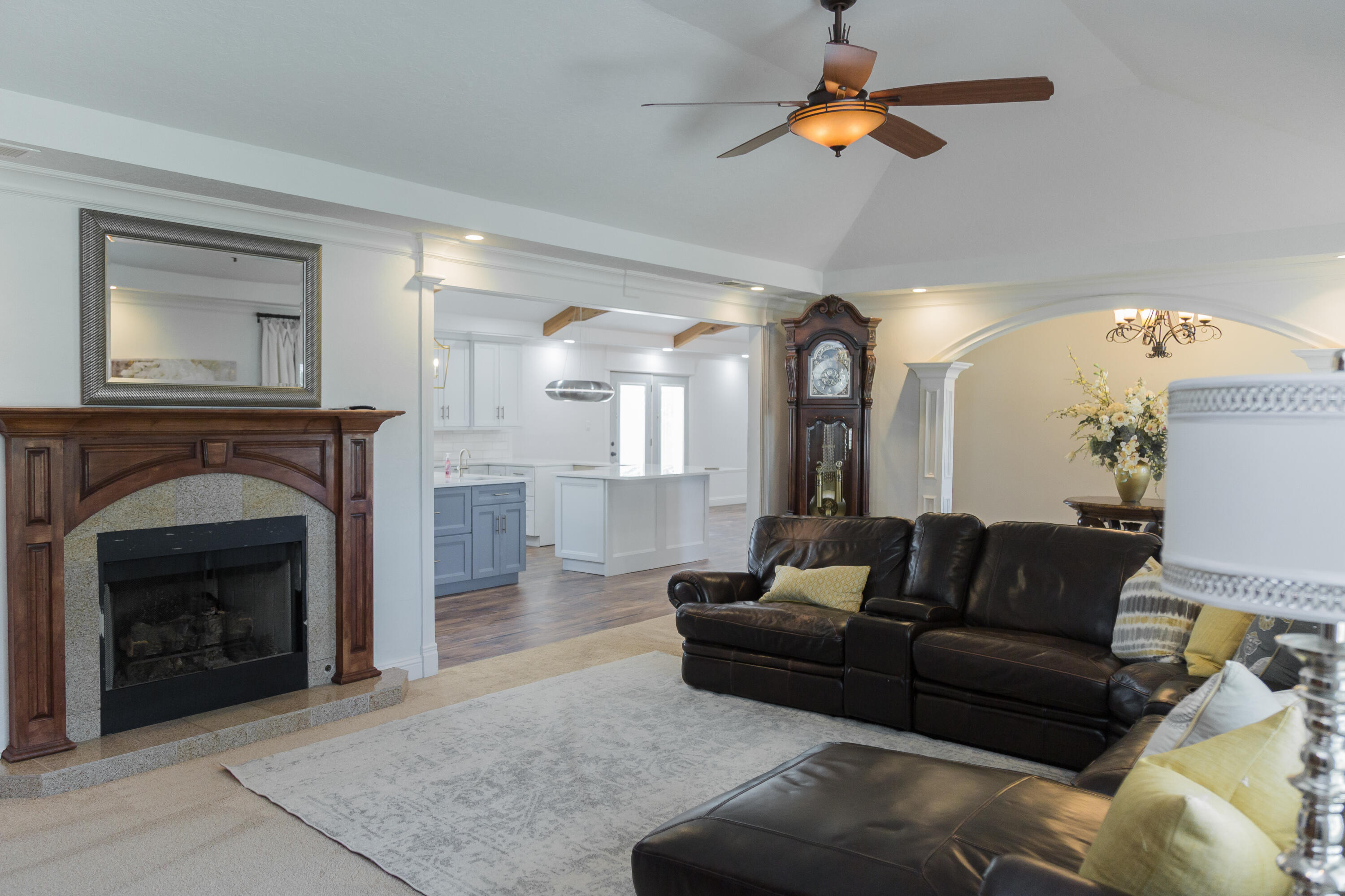 1308 West 24th Street Plainview, TX 79072 - Photo 15 of 85 a living room with furniture and a fireplace