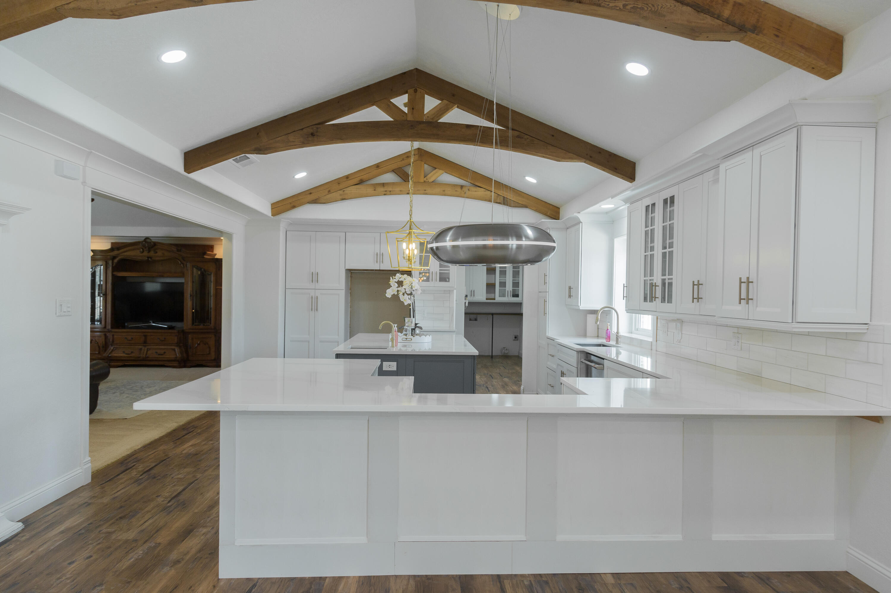 1308 West 24th Street Plainview, TX 79072 - Photo 18 of 85 a view of kitchen with stainless steel appliances granite countertop a stove and a sink