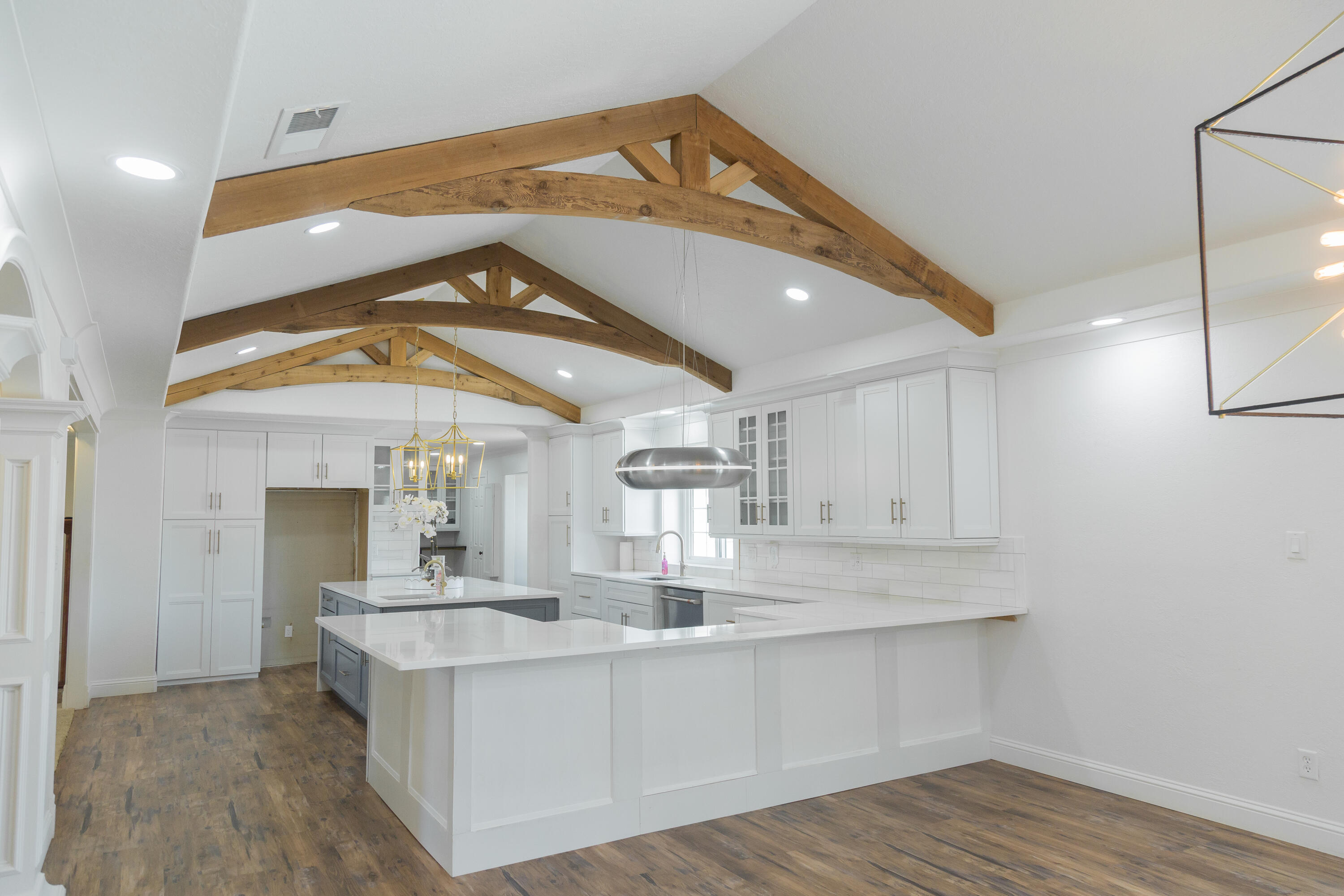 1308 West 24th Street Plainview, TX 79072 - Photo 19 of 85 a view of kitchen with granite countertop cabinets with stainless steel appliances