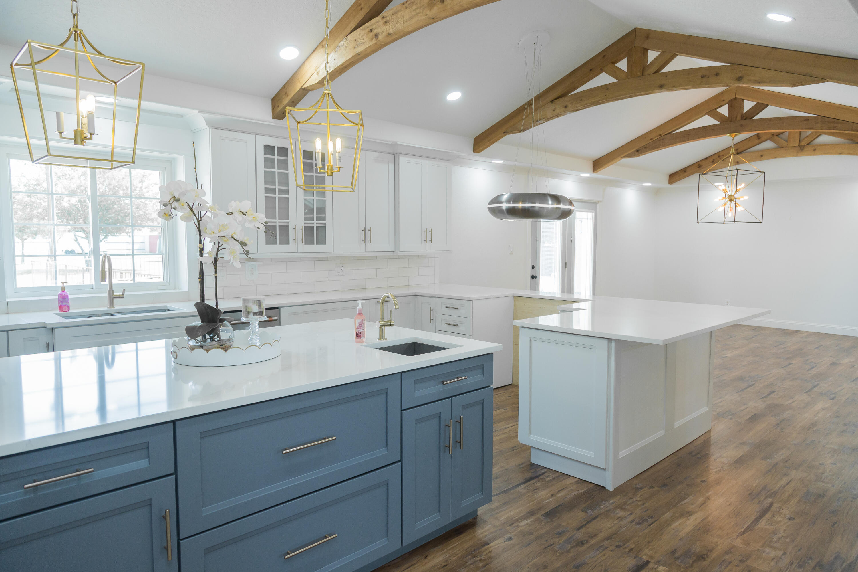 1308 West 24th Street Plainview, TX 79072 - Photo 22 of 85 a bathroom with a double vanity sink and a mirror