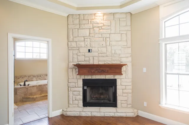 a swimming pool with outdoor seating and yard