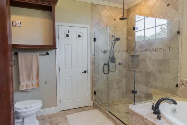 a view of a swimming pool with an outdoor space and seating area