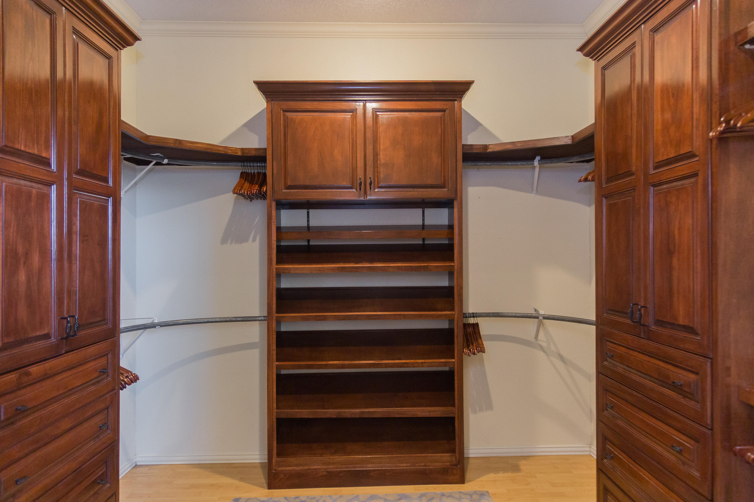 1308 West 24th Street Plainview, TX 79072 - Photo 52 of 85 a view of walk in closet with clothes and shoes