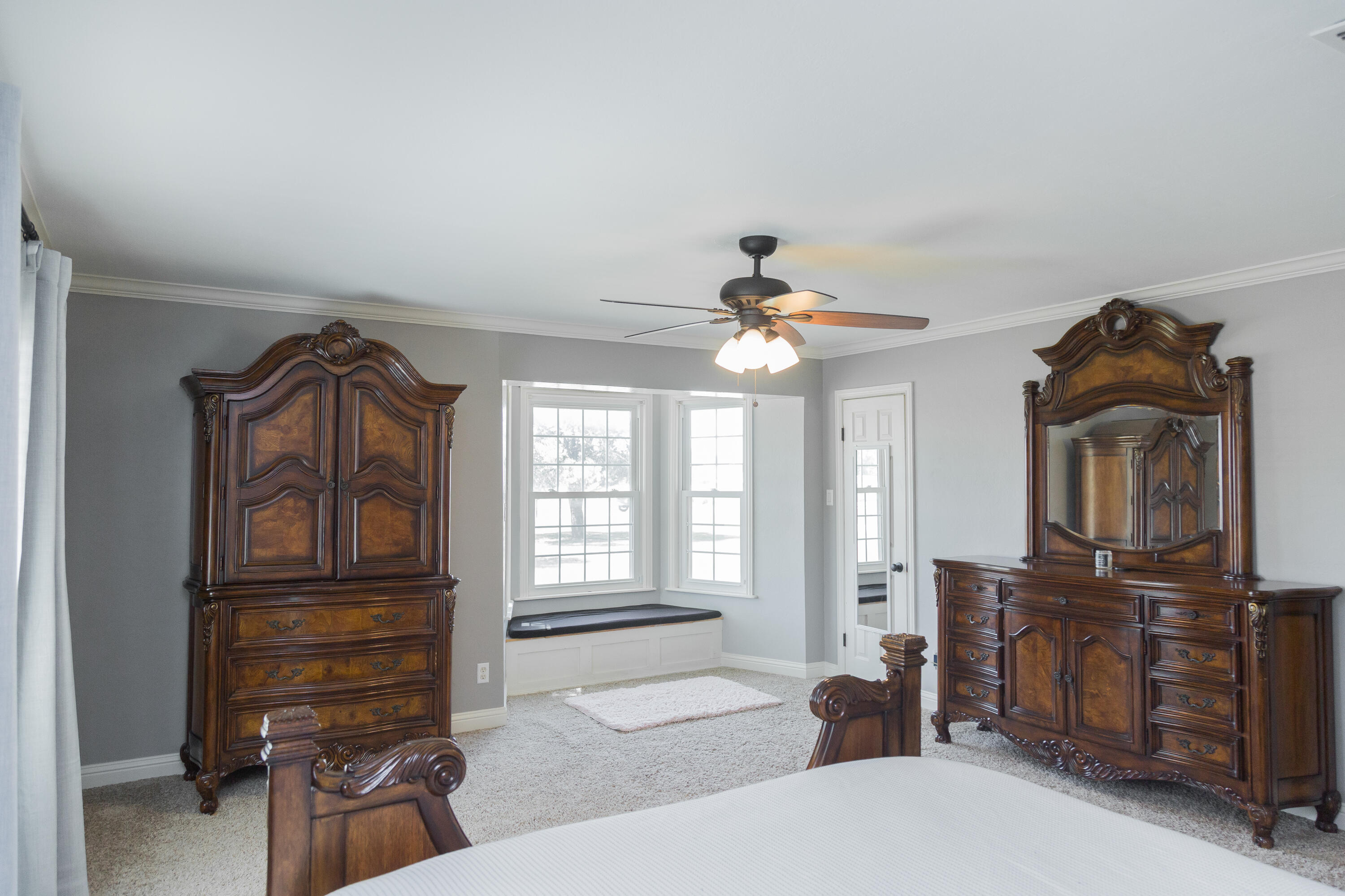1308 West 24th Street Plainview, TX 79072 - Photo 68 of 85 a living room with furniture and a flat screen tv