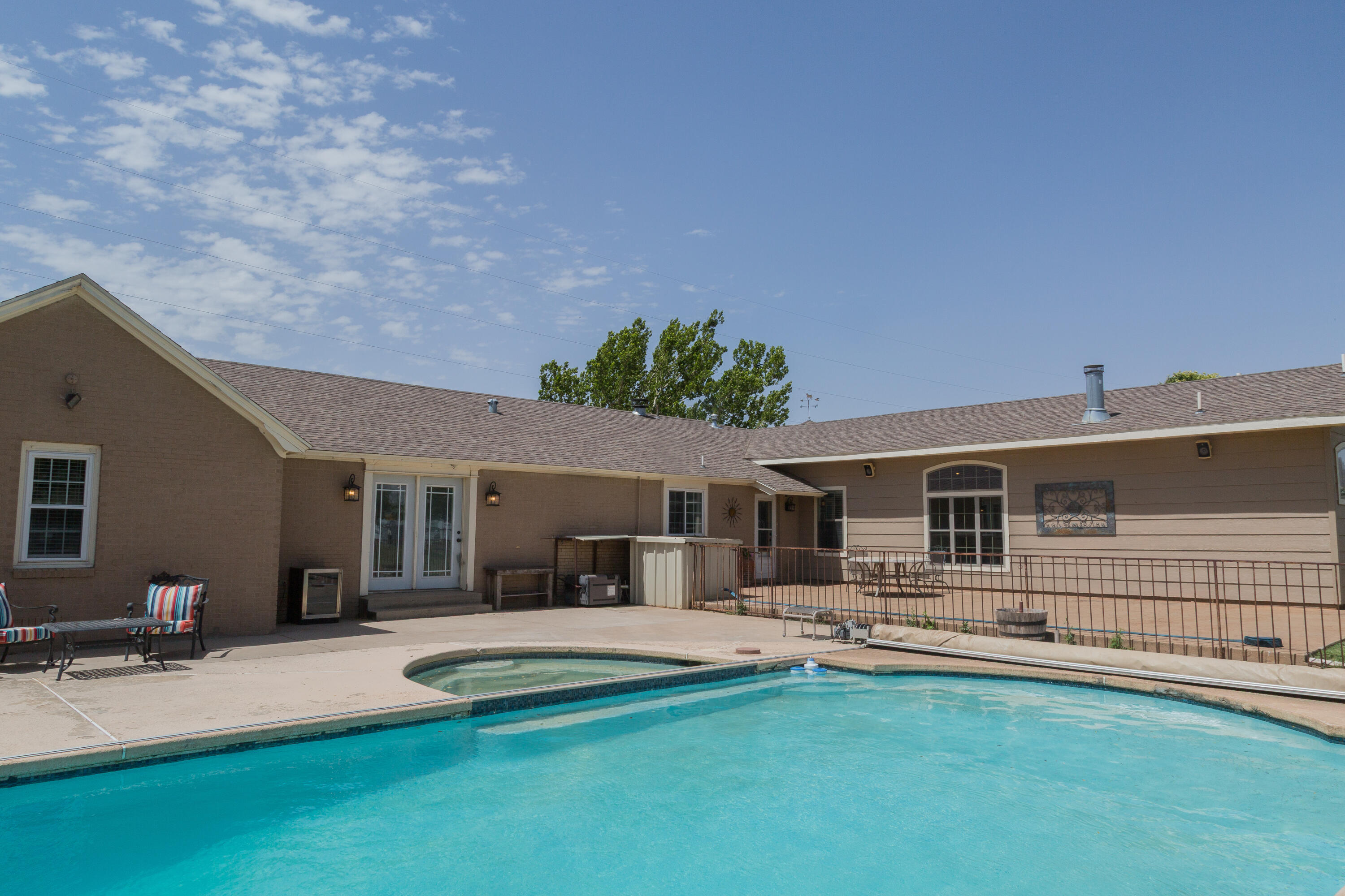 1308 West 24th Street Plainview, TX 79072 - Photo 76 of 85 a front view of house with yard patio and fire pit
