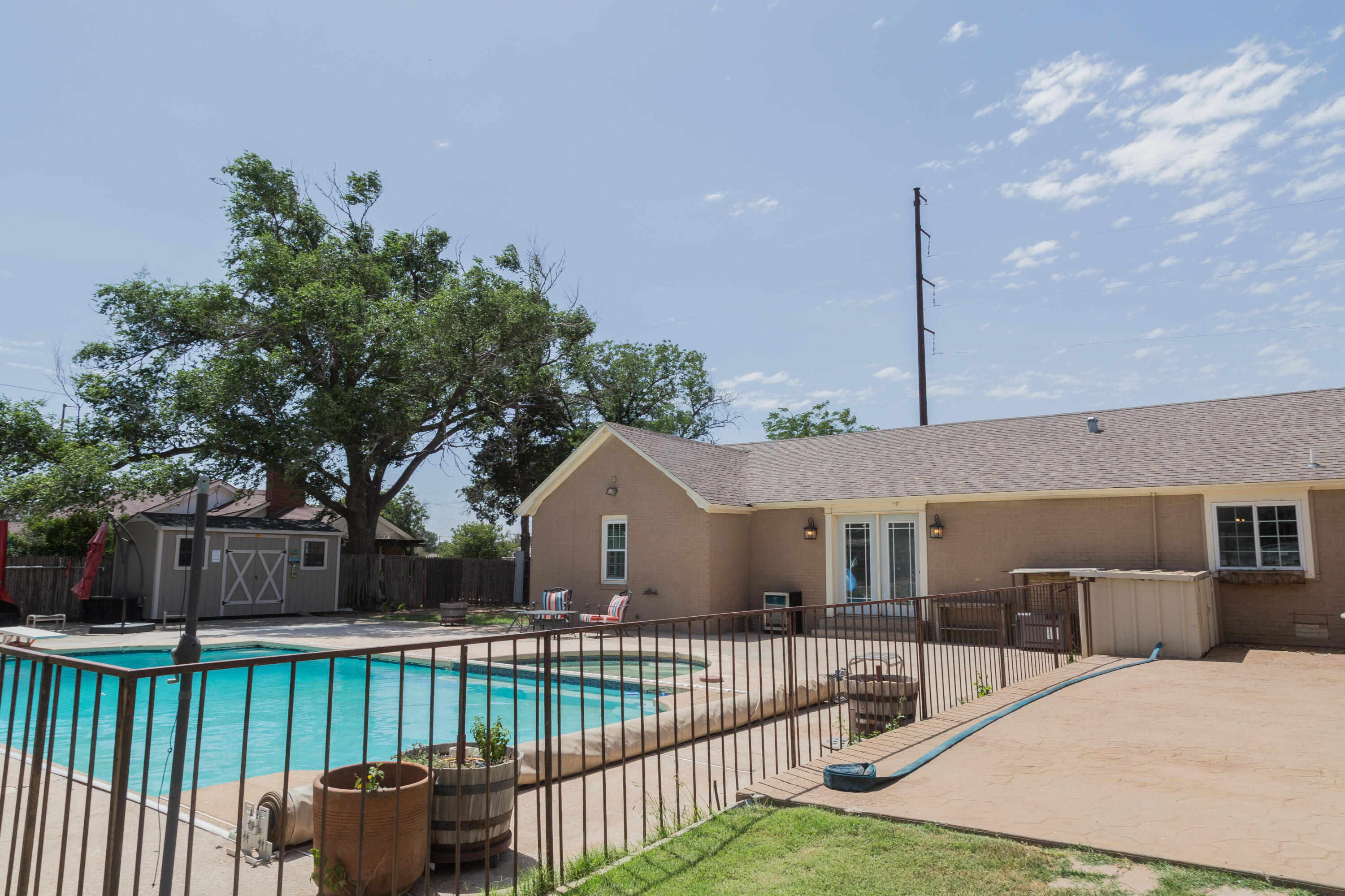 1308 West 24th Street Plainview, TX 79072 - Photo 79 of 85 a view of a patio with a table and chairs