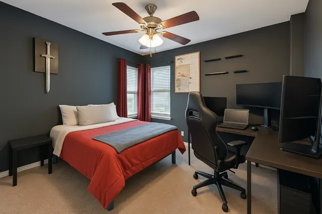 a bedroom with furniture and window