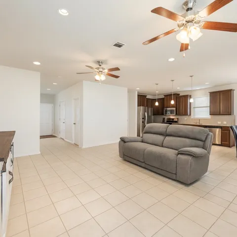 a bedroom with a bed and a desk