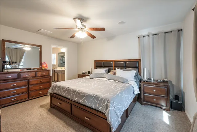 a bathroom with a sink toilet and a mirror