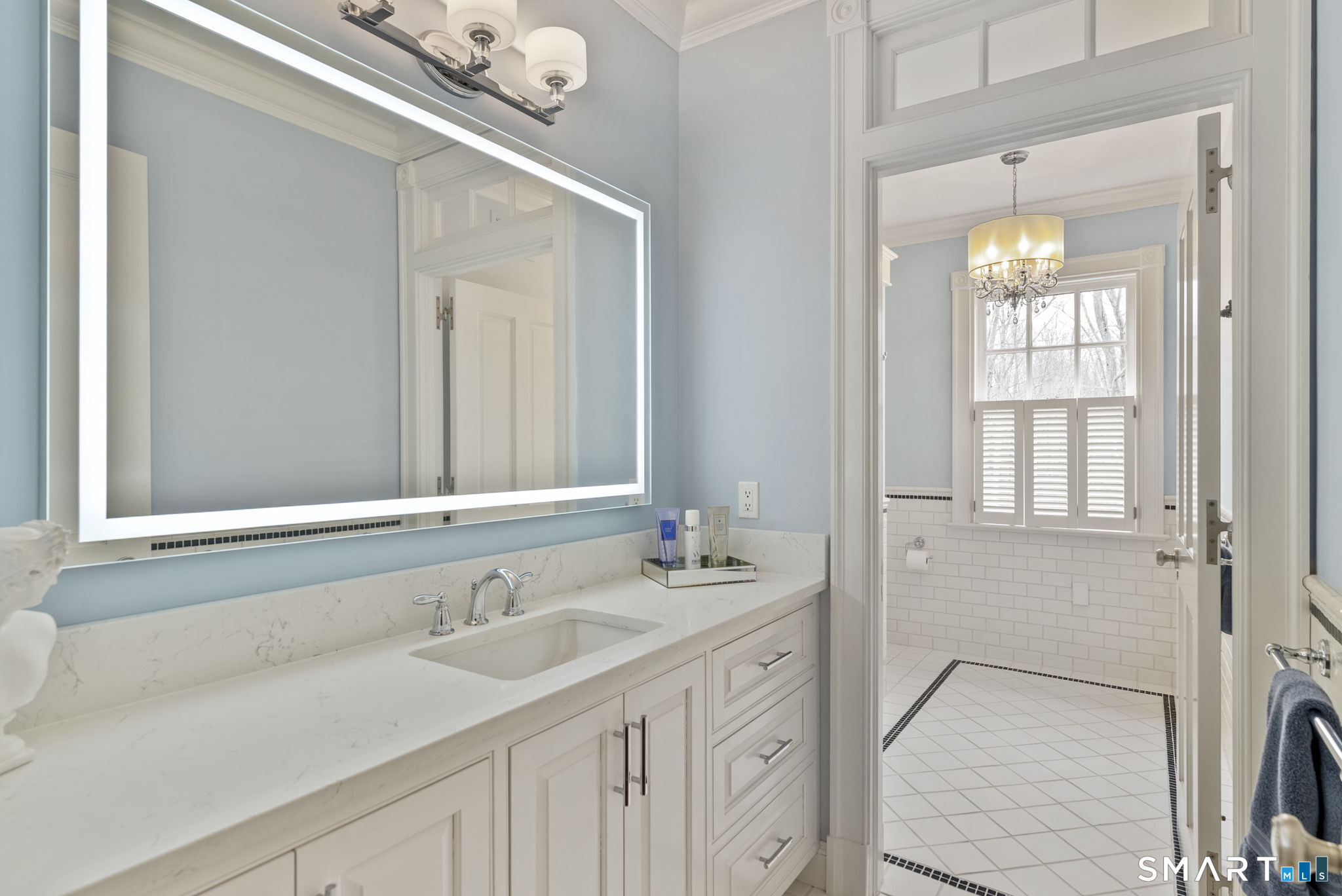 5 Viewpoint Lane Ellington, CT 06029 - Photo 28 of 40 a bathroom with a sink and a mirror