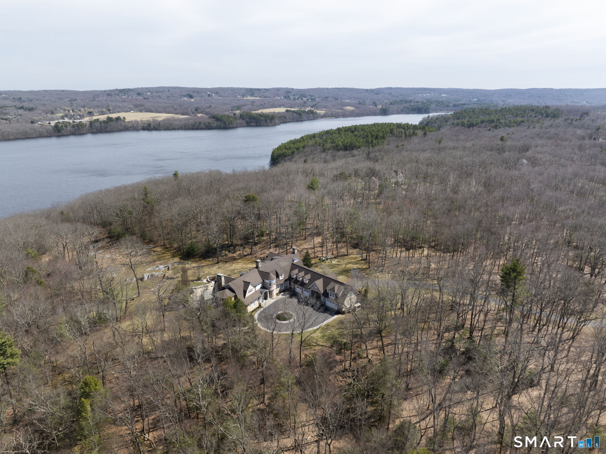 5 Viewpoint Lane Ellington, CT 06029 - Photo 38 of 40 a view of a lake with beach and outdoor space