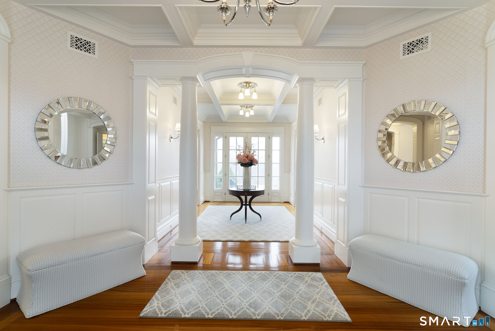 5 Viewpoint Lane Ellington, CT 06029 - Photo 5 of 40 a living room with furniture and a chandelier