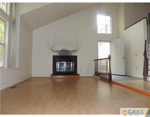 2304 Buckingham Circle Middletown, NJ 07748 - Photo 16 of 25 a view of an empty room with a window