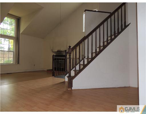 2304 Buckingham Circle Middletown, NJ 07748 - Photo 4 of 25 a view of entryway with wooden floor
