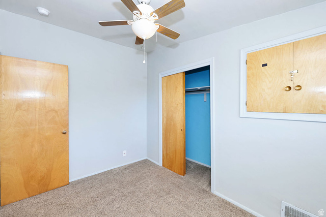 1272 Cook Street Ogden, UT 84404 - Photo 27 of 46 Light grey wall paint with brown carpet flooring