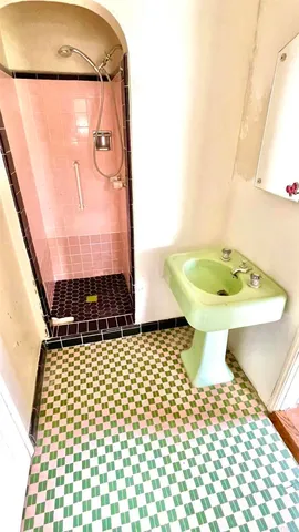 a bathroom with a sink toilet and bathtub