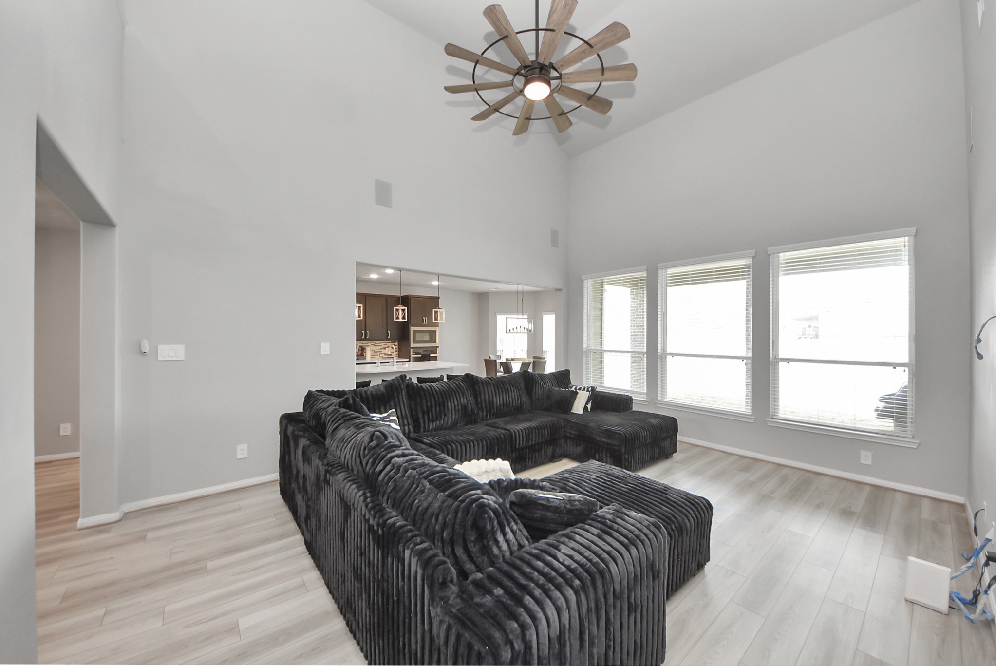 16735 Rockwall Street Conroe, TX 77303 - Photo 14 of 37 a living room with furniture and a large window