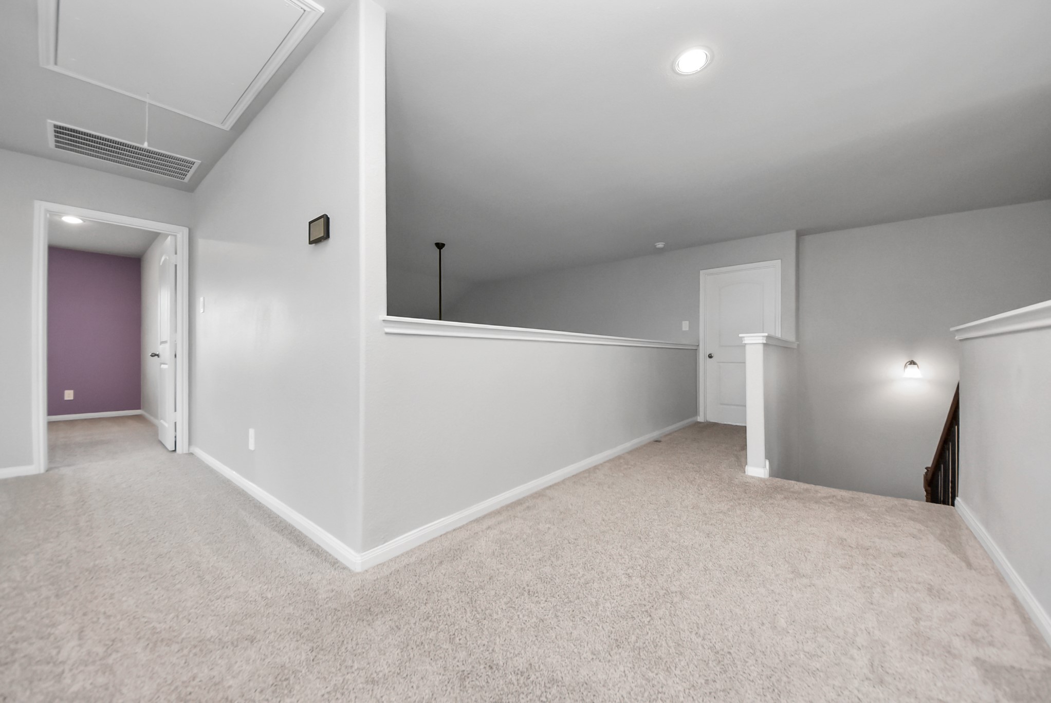 16735 Rockwall Street Conroe, TX 77303 - Photo 22 of 37 At the center of the upstairs level is a large game room that serves as a flexible gathering space.