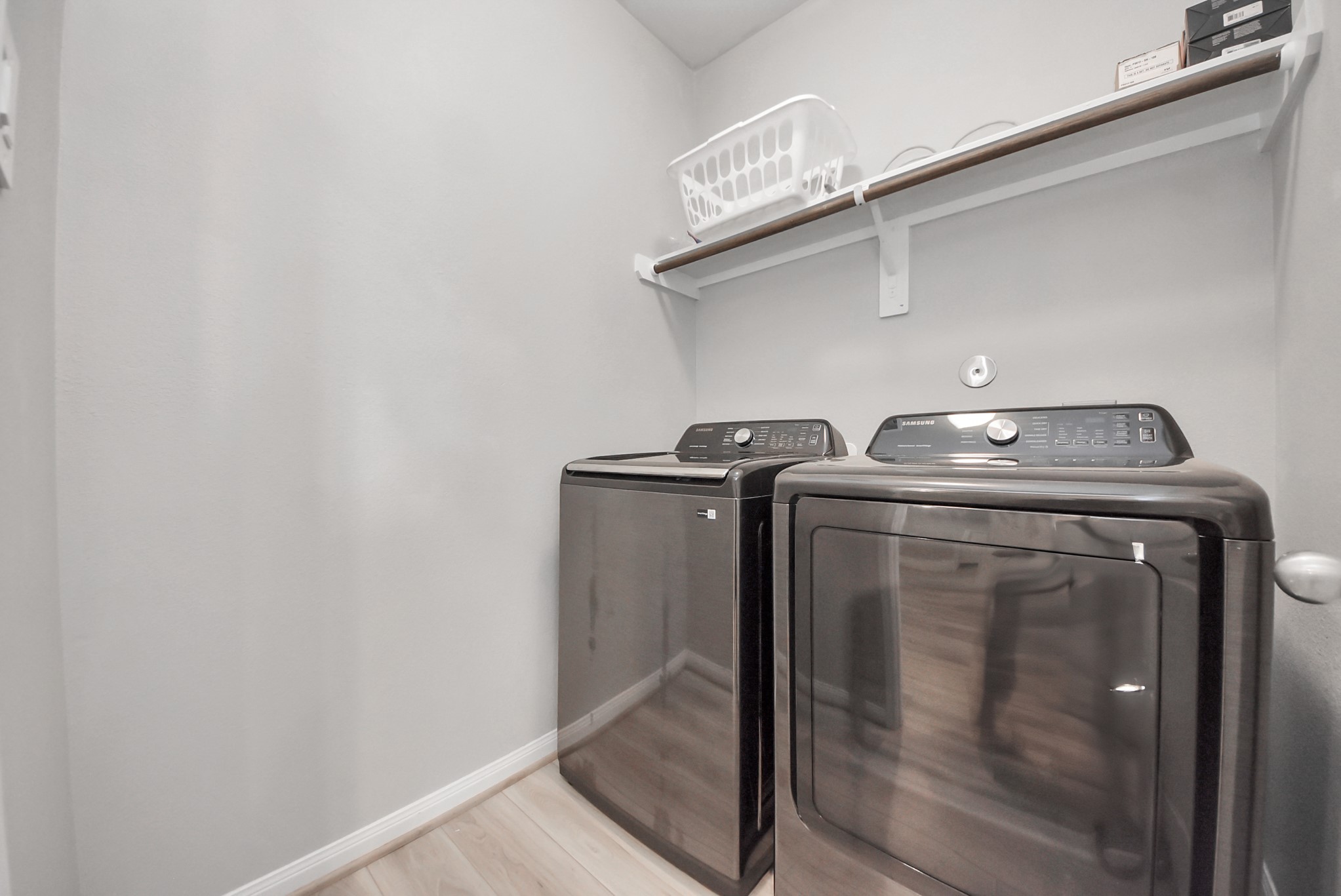 16735 Rockwall Street Conroe, TX 77303 - Photo 28 of 37 a utility room with dryer and washer