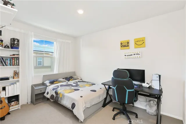 a workspace with furniture and a window