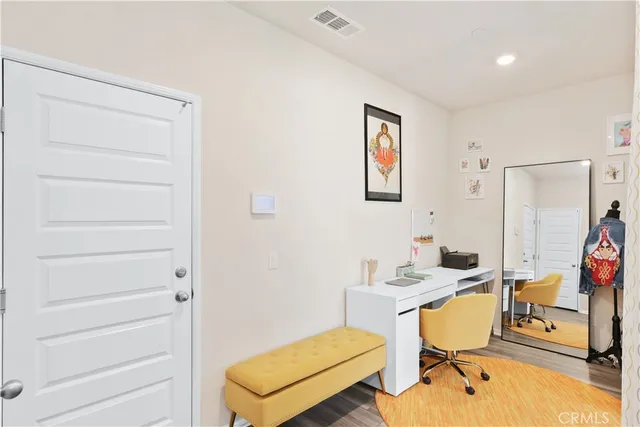 a view of a living room and bathroom
