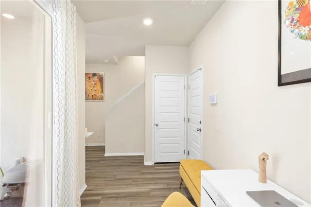 a view of a bedroom with gym equipment