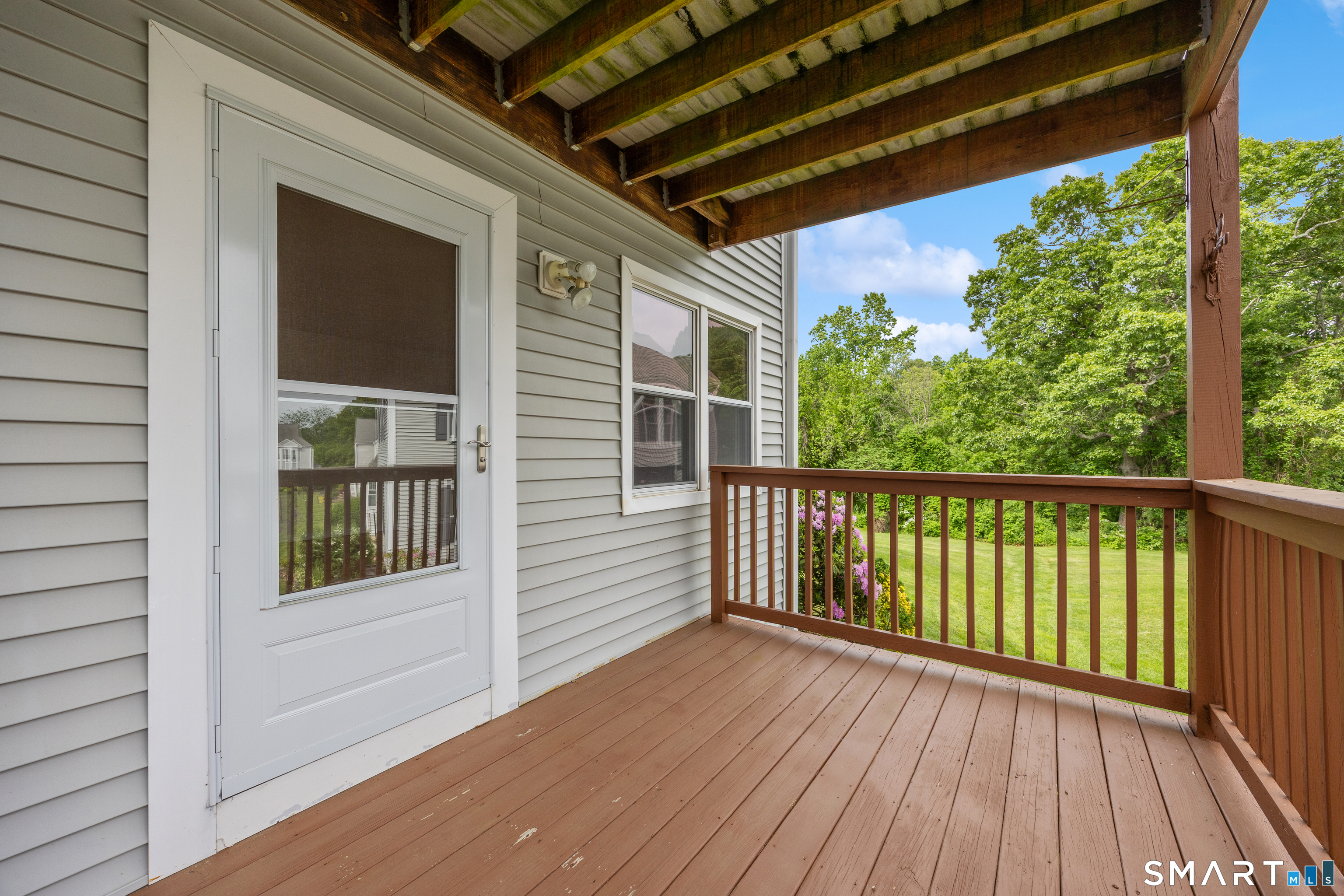 111 Strathmore Lane, Unit 111 Wallingford, CT 06492 - Photo 19 of 32 Large deck off living room