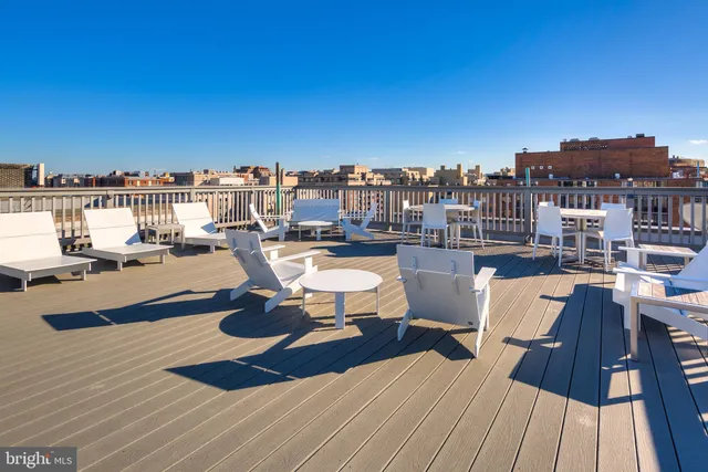 a view of a terrace with seating area