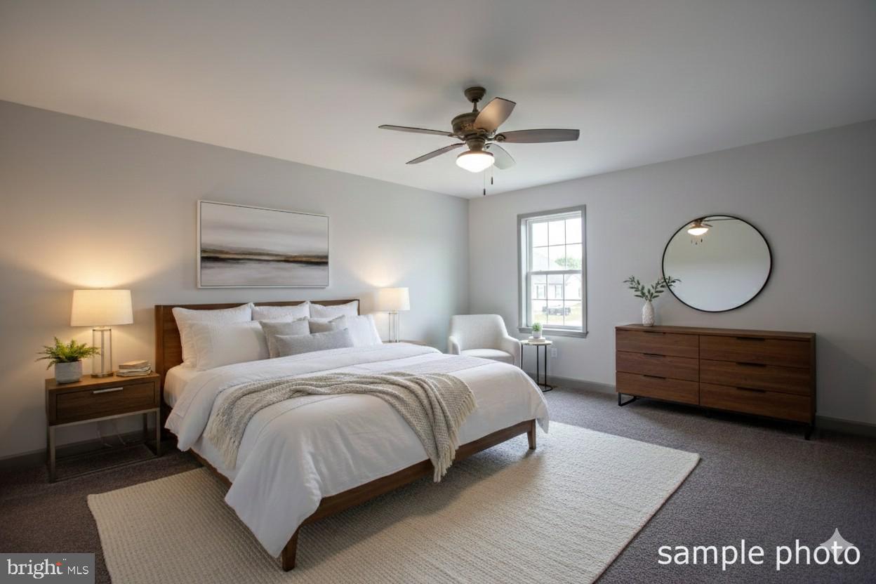 23 Castle Drive Robesonia, PA 19551 - Photo 9 of 15 a bed room with a bed mirror and a window