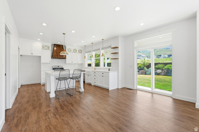 338 Windy Rdg Drive Smithfield, UT 84335 - Photo 11 of 63 Open-concept living space with wood-finish flooring