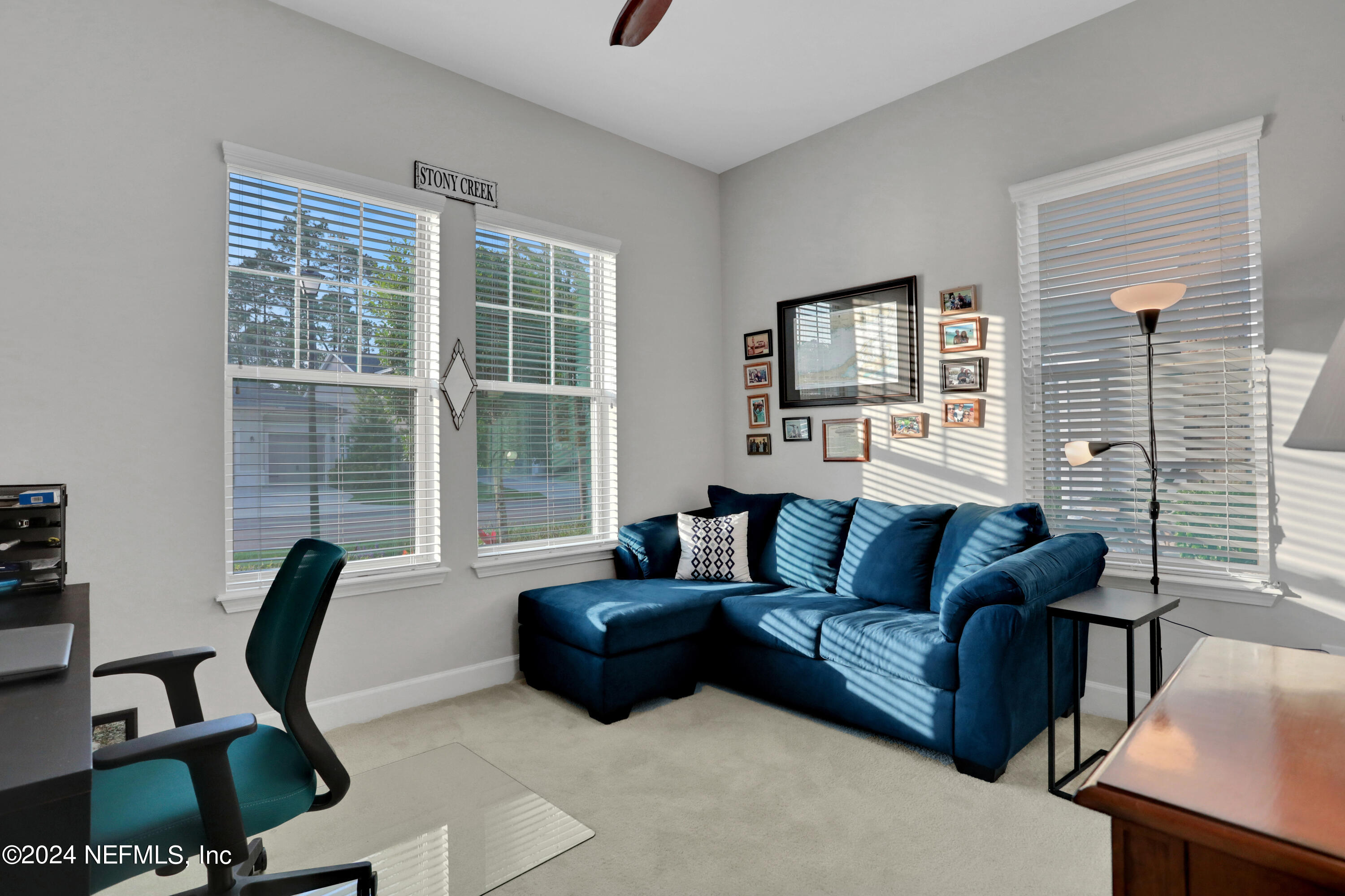 75 Hatter Drive Jacksonville, FL 32081 - Photo 12 of 45 a living room with furniture and a window