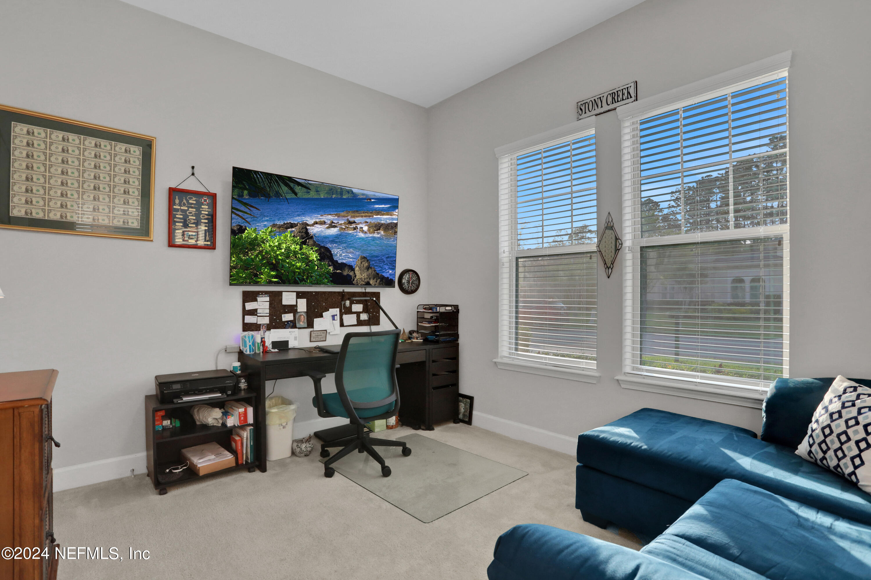 75 Hatter Drive Jacksonville, FL 32081 - Photo 13 of 45 a view of a livingroom with workspace and a couch