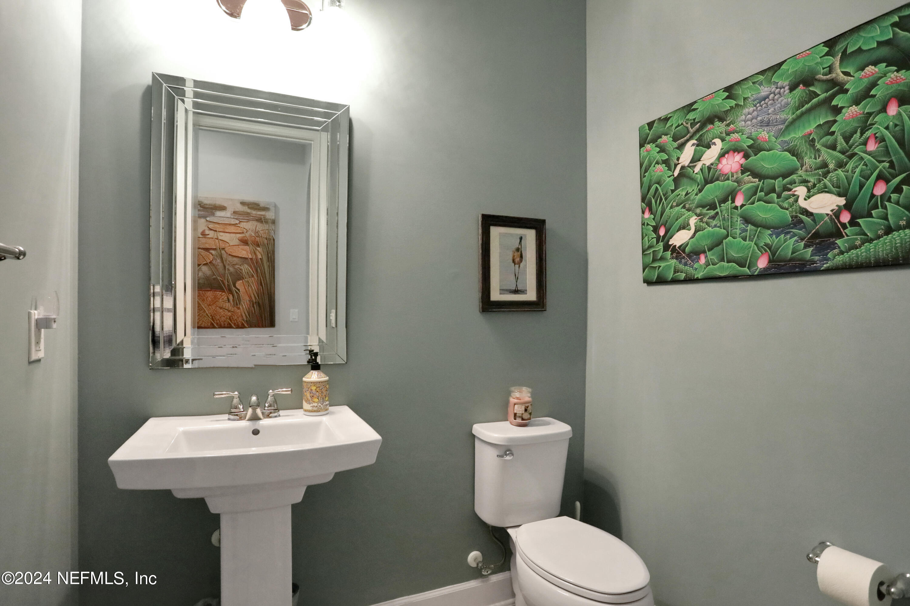 75 Hatter Drive Jacksonville, FL 32081 - Photo 14 of 45 a bathroom with a toilet sink and mirror