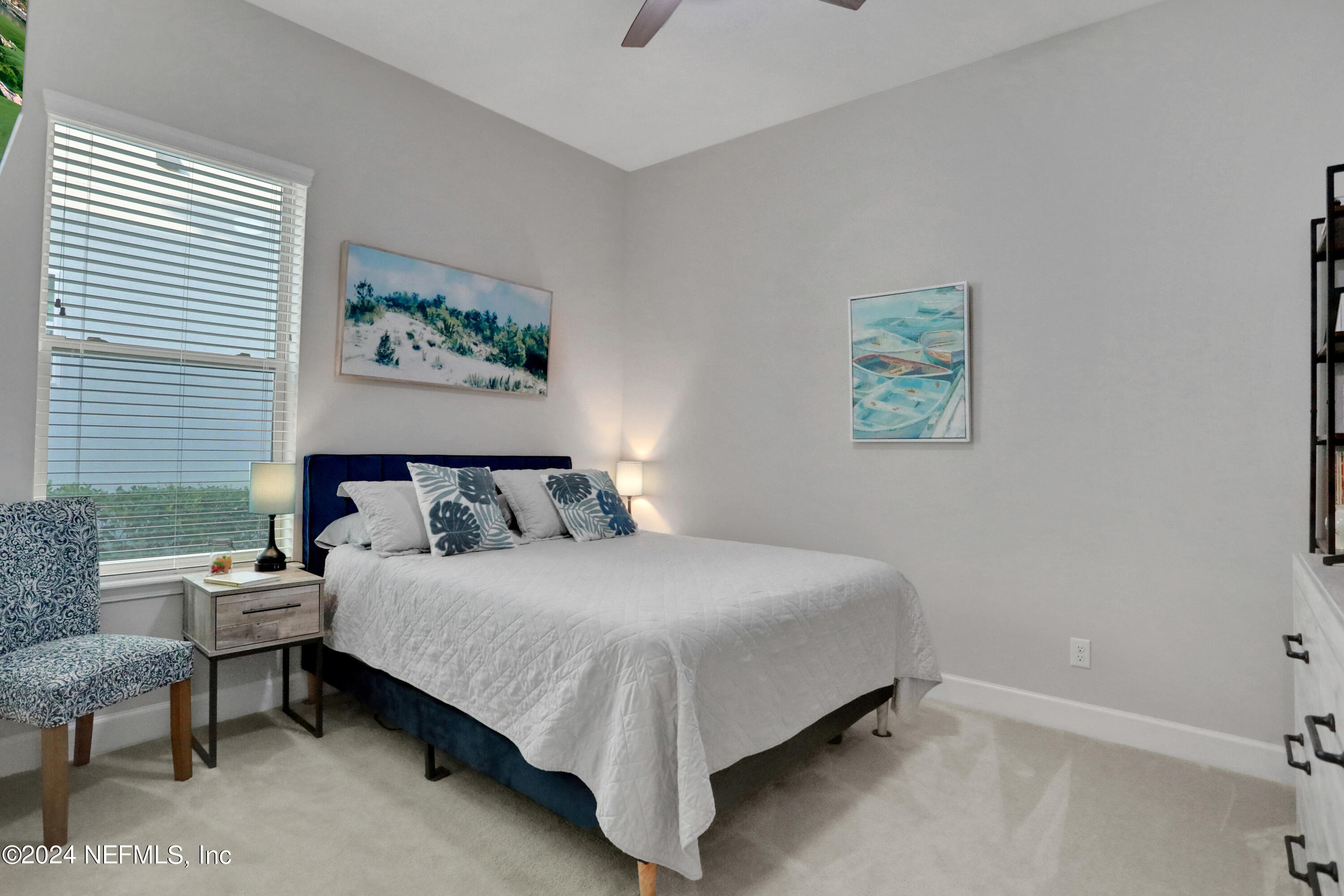 75 Hatter Drive Jacksonville, FL 32081 - Photo 15 of 45 a bedroom with a bed and a painting on the wall