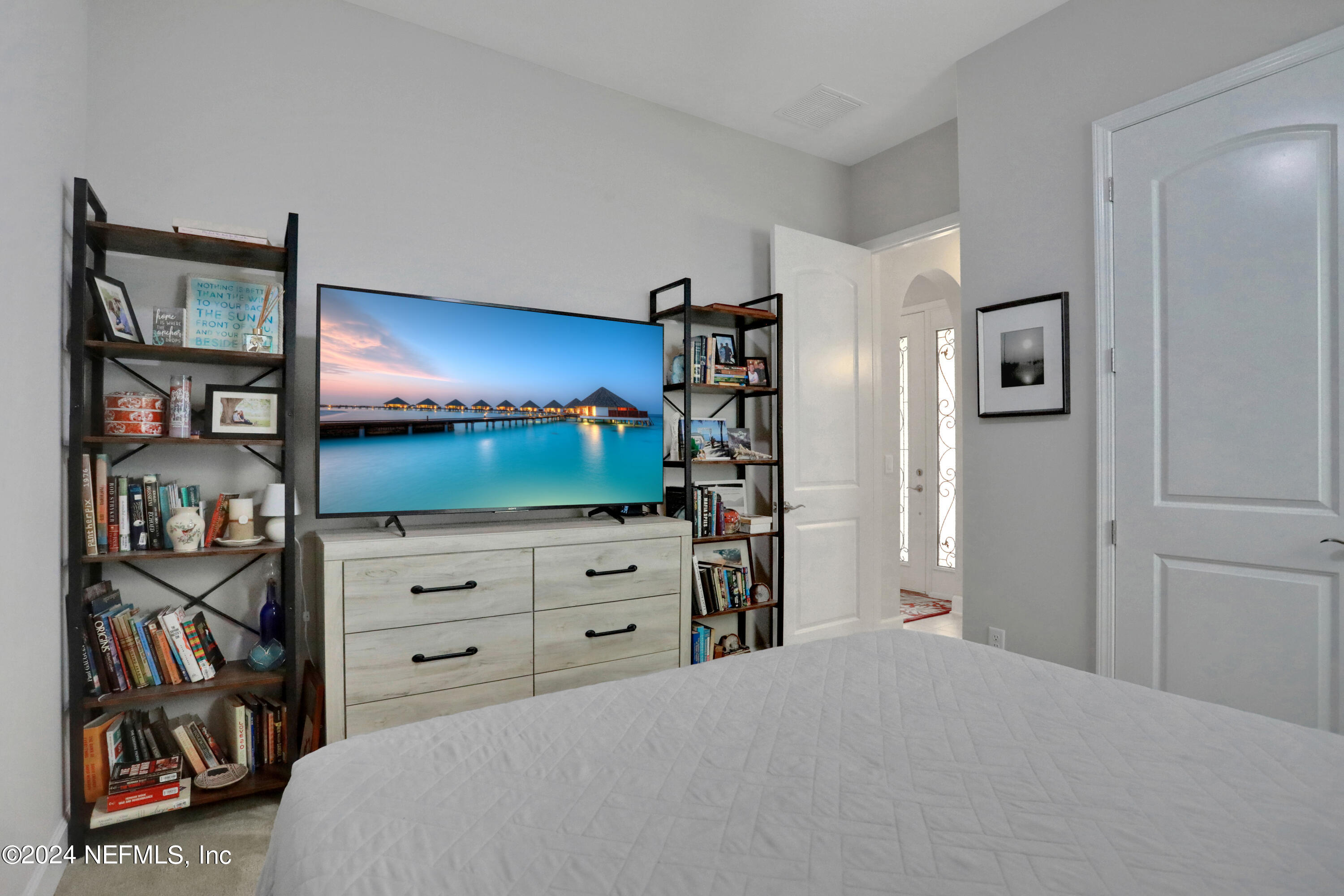 75 Hatter Drive Jacksonville, FL 32081 - Photo 16 of 45 a bedroom with a bed and closet