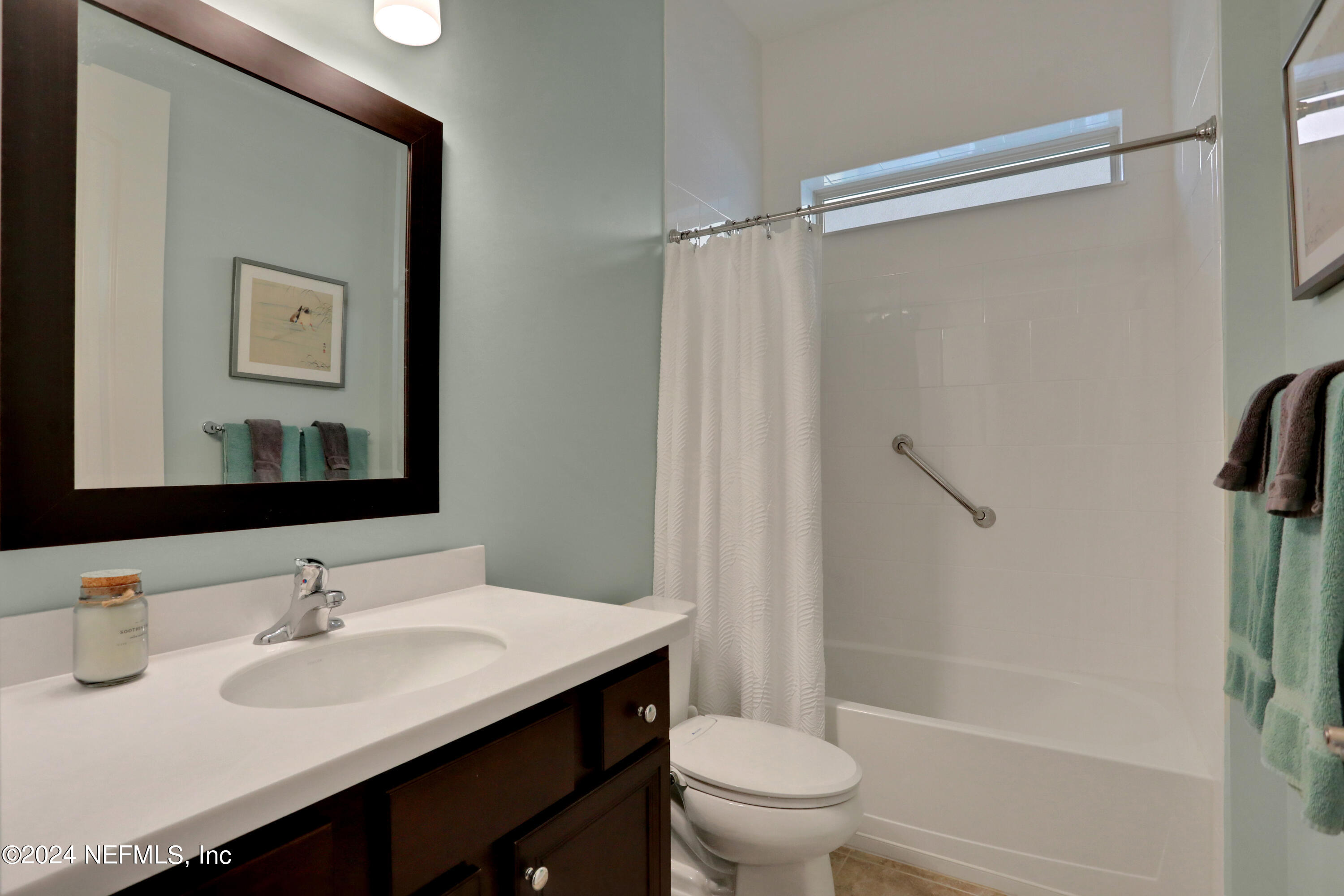 75 Hatter Drive Jacksonville, FL 32081 - Photo 17 of 45 a bathroom with a sink and a mirror