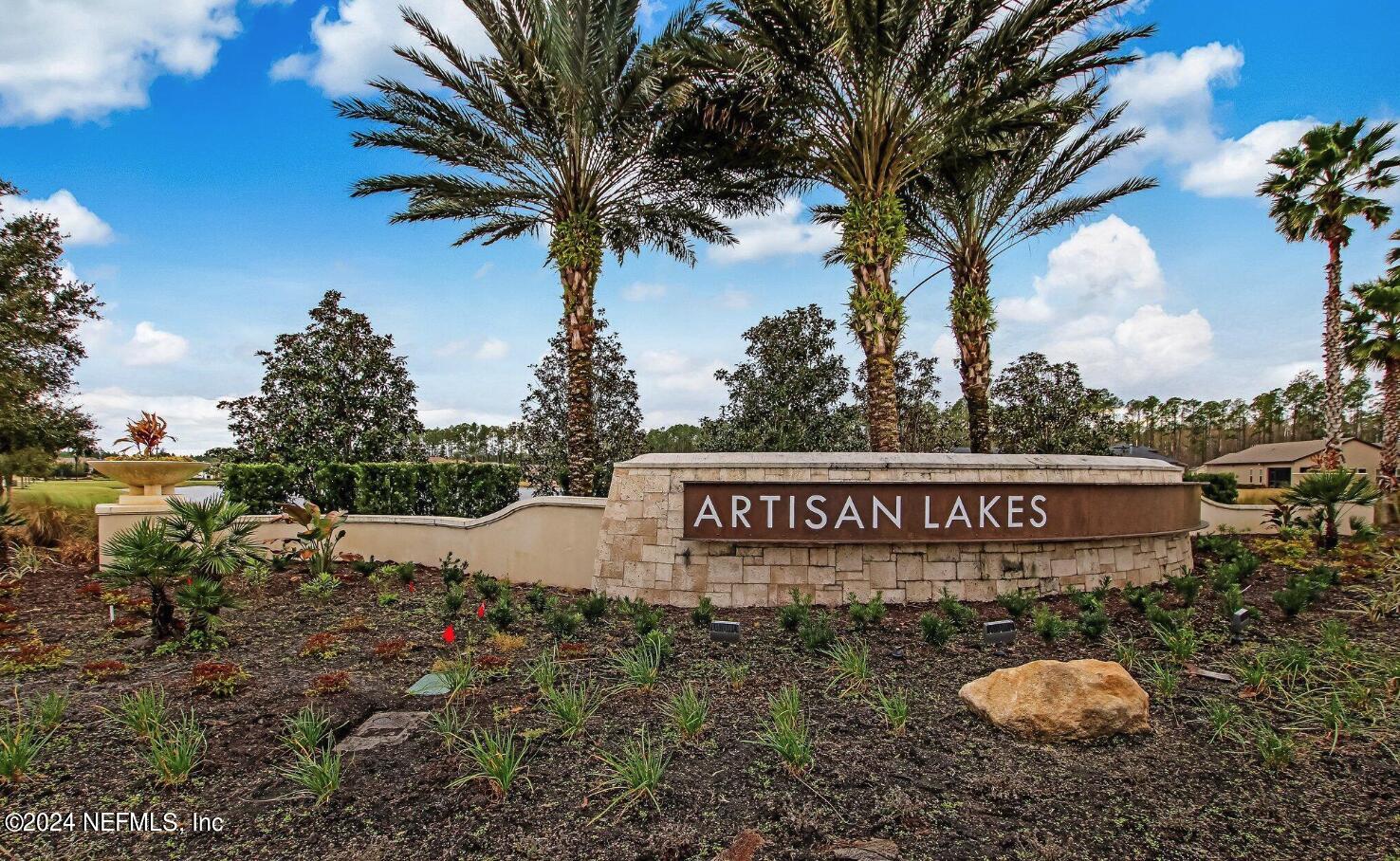 75 Hatter Drive Jacksonville, FL 32081 - Photo 22 of 45 a view of outdoor space with sign board and garden