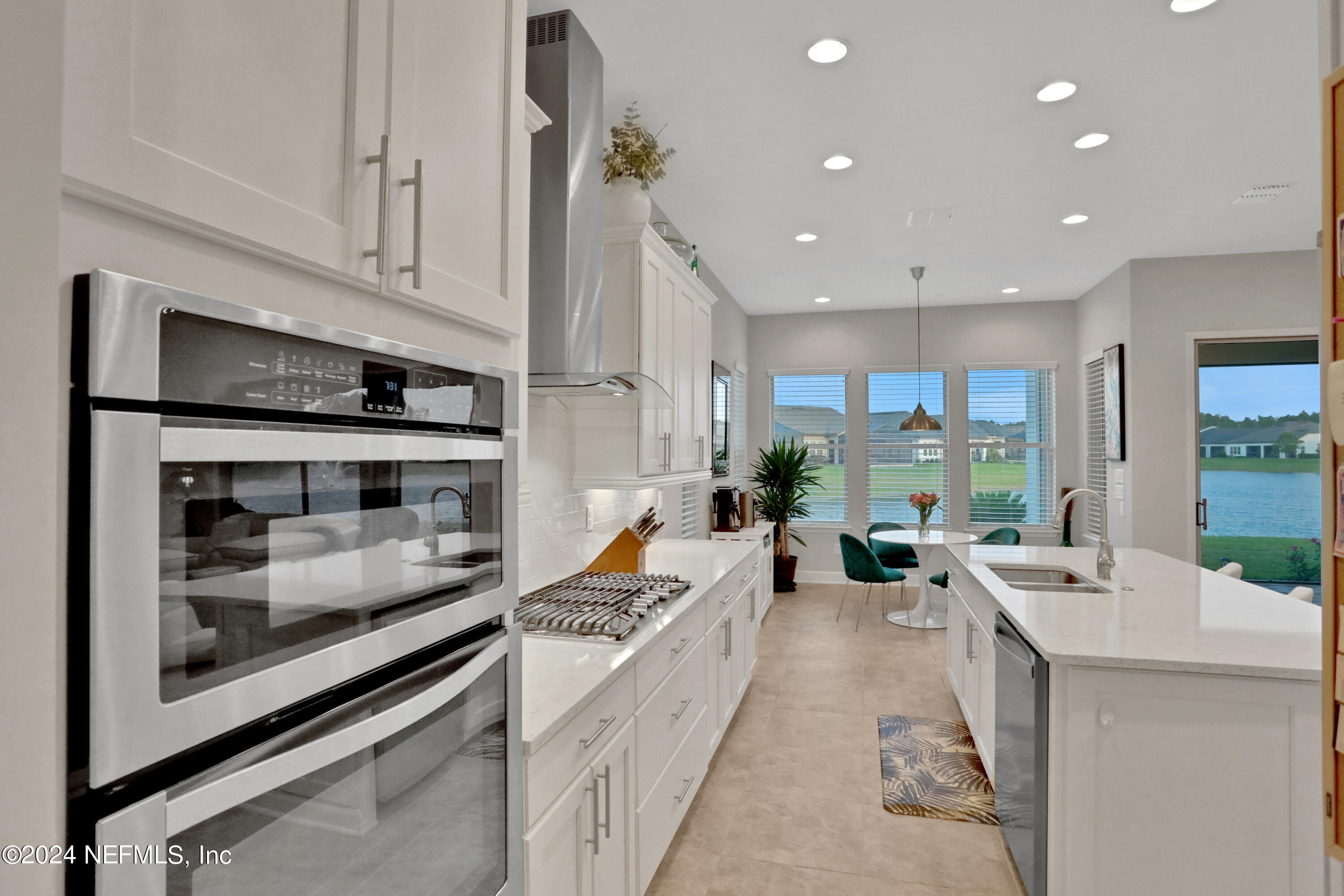 75 Hatter Drive Jacksonville, FL 32081 - Photo 23 of 45 a kitchen with counter top space a sink and appliances