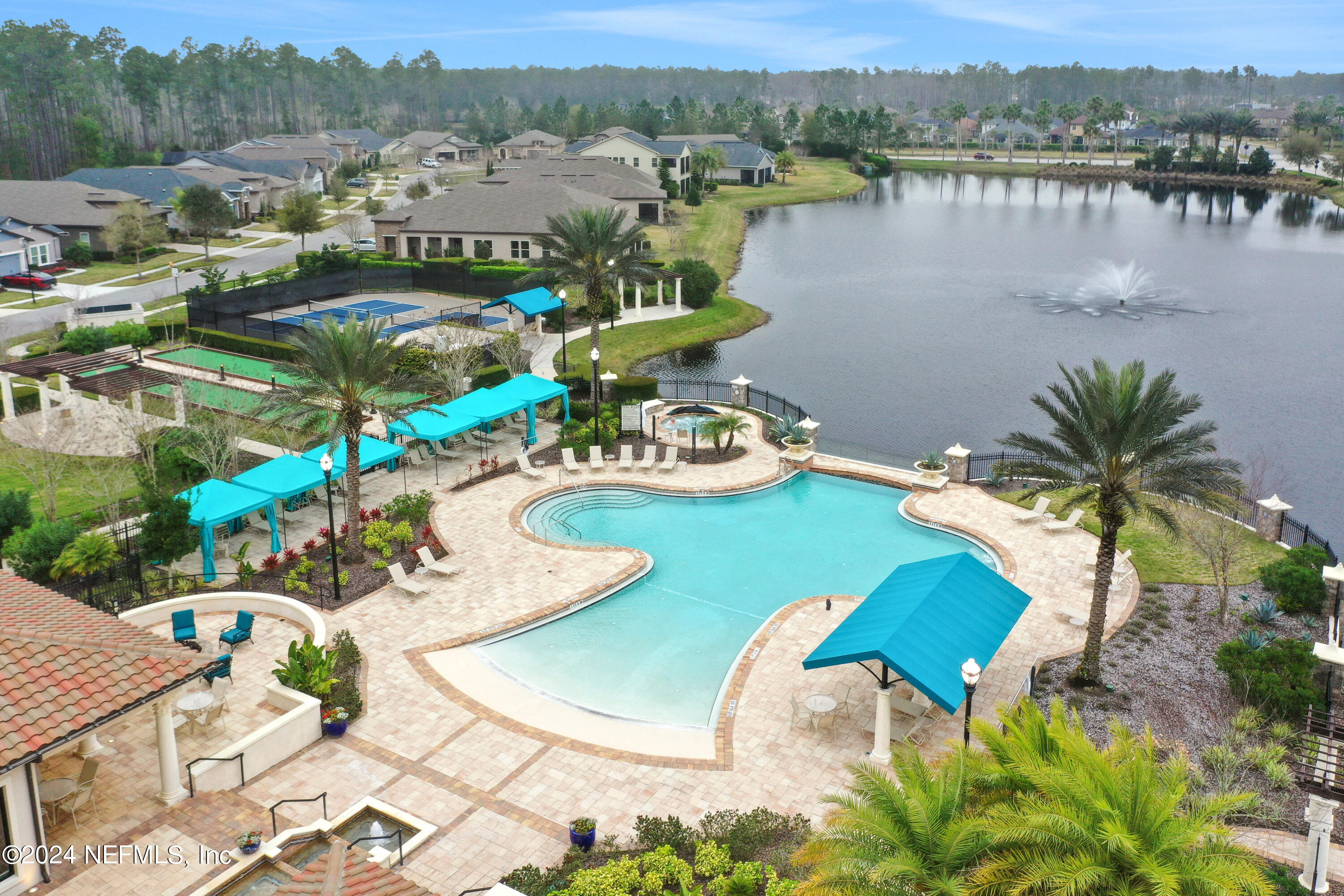 75 Hatter Drive Jacksonville, FL 32081 - Photo 25 of 45 a view of a lake with a table and chairs