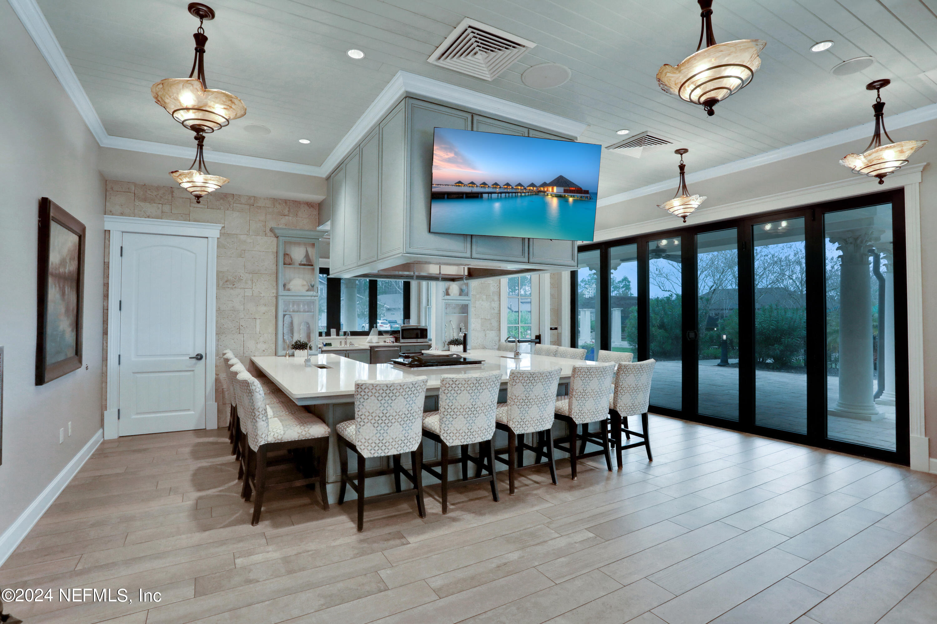 75 Hatter Drive Jacksonville, FL 32081 - Photo 28 of 45 a view of a dining room with furniture wooden floor and chandelier