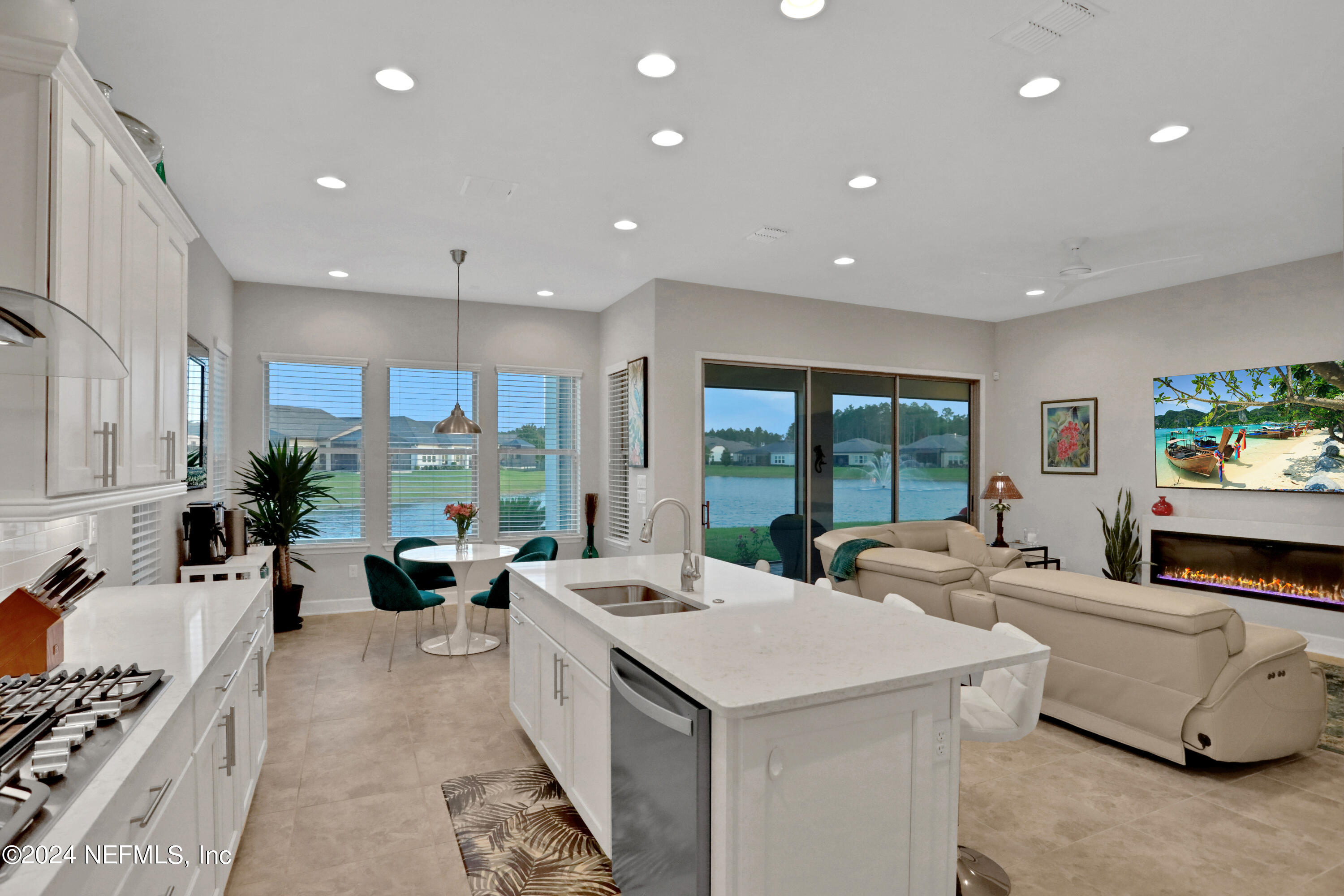 75 Hatter Drive Jacksonville, FL 32081 - Photo 3 of 45 a large living room with stainless steel appliances furniture a large window and a couch