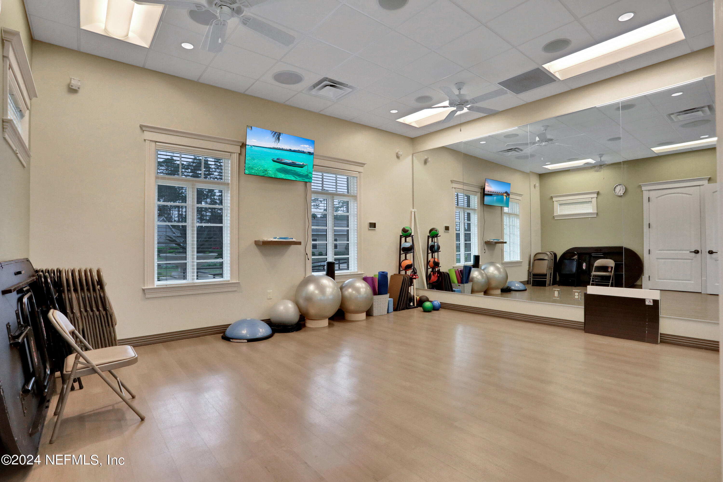 75 Hatter Drive Jacksonville, FL 32081 - Photo 31 of 45 a living room with furniture and a large window