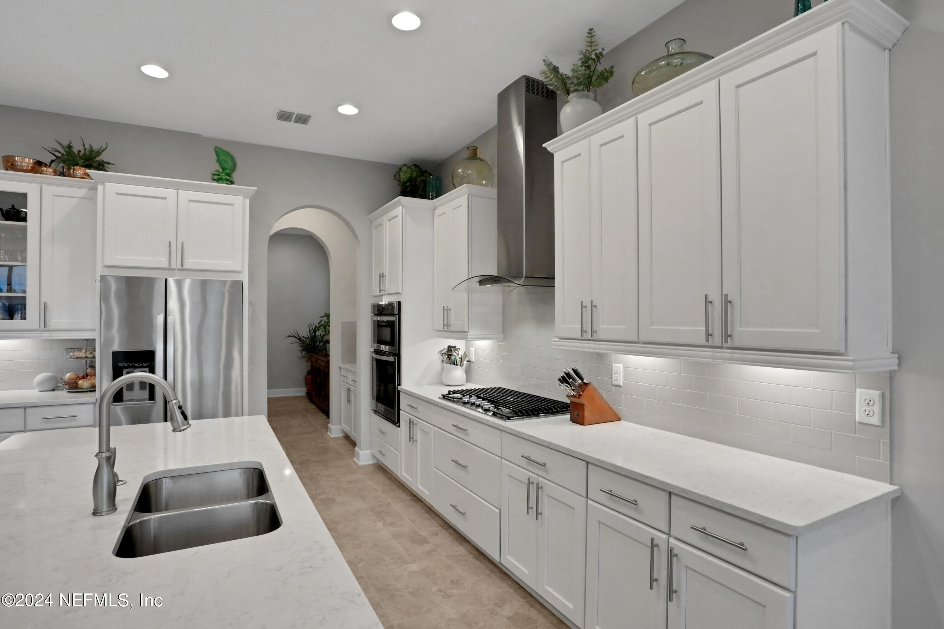 75 Hatter Drive Jacksonville, FL 32081 - Photo 4 of 45 a kitchen with stainless steel appliances granite countertop a sink and cabinets