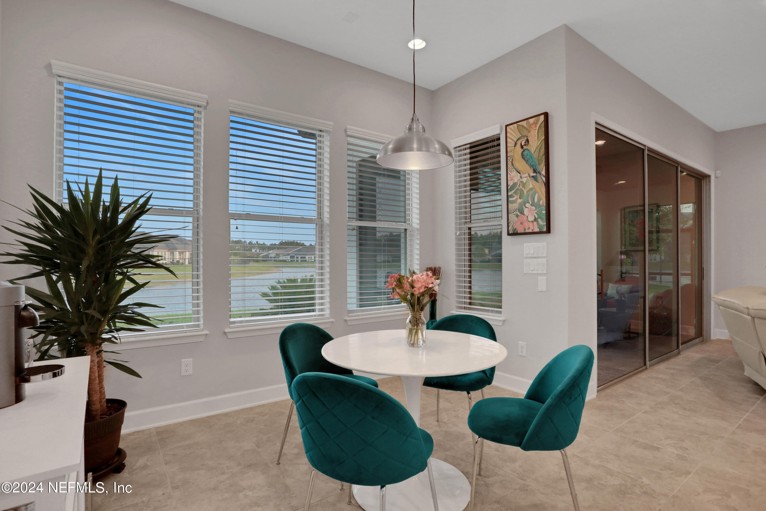 75 Hatter Drive Jacksonville, FL 32081 - Photo 8 of 45 a living room with furniture potted plant and a table