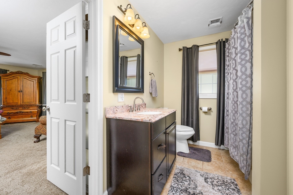 138 Sprague Street Fall River, MA 02724 - Photo 17 of 34 a bathroom with a sink and a mirror