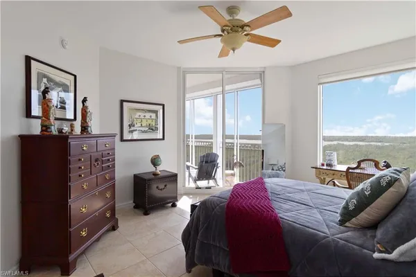 a view of a balcony with chairs