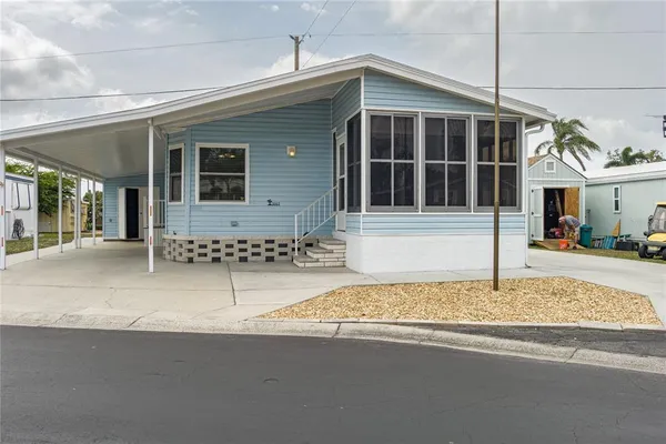 a front view of a house with garage